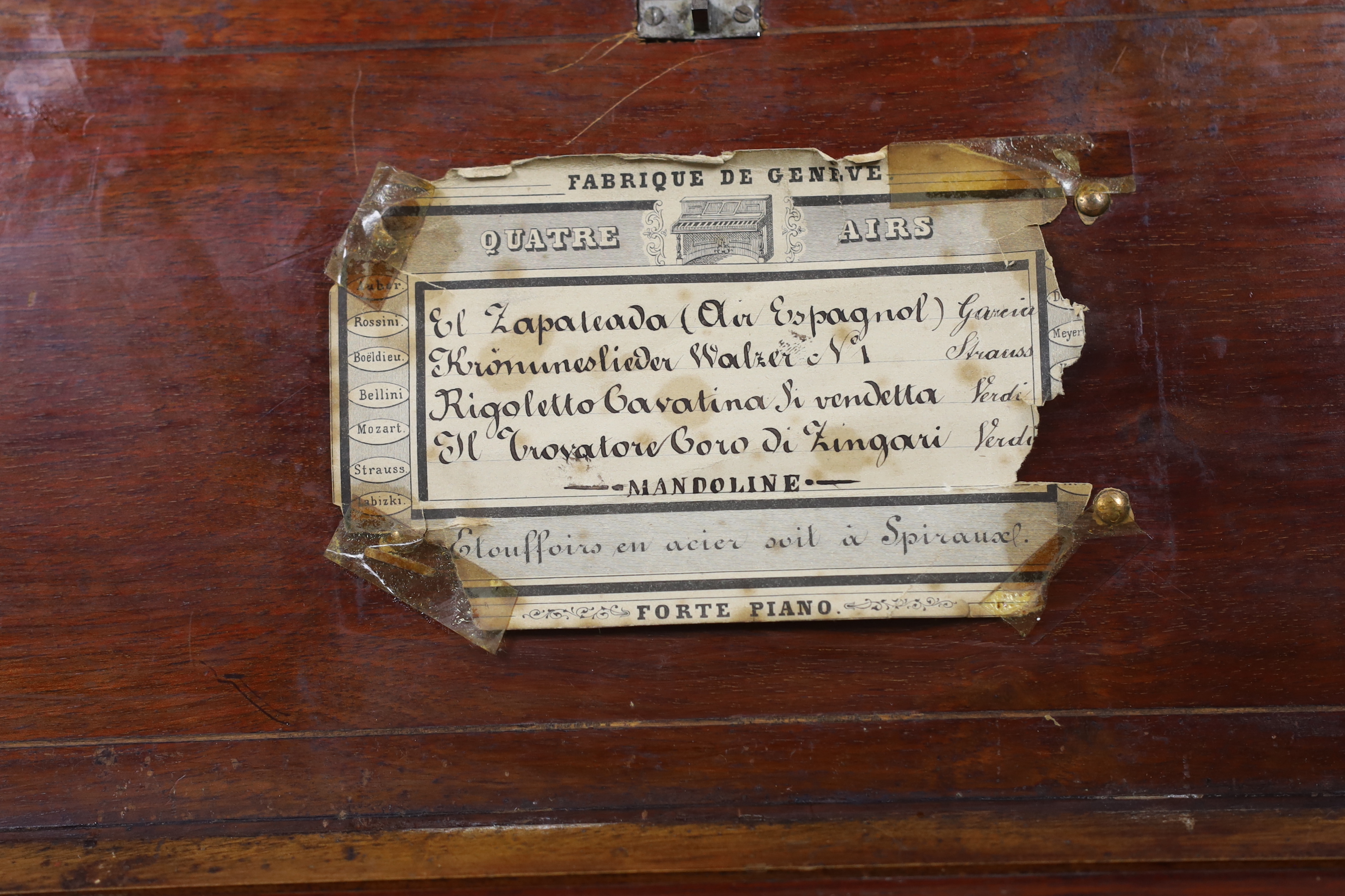 A late 19th century Swiss ‘forte piano’ cylinder musical box, in an inlaid mahogany case, playing four airs on two hundred and nineteen teeth, barrel 39cm wide, case; 57cm wide, 17cm deep, 13cm high, on a later separate